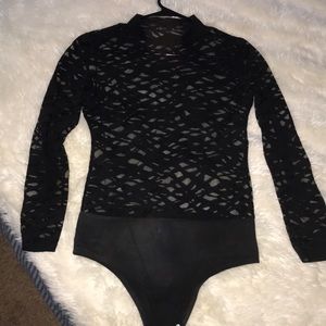Long sleeved sheer zebra print body suit